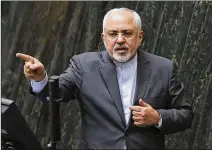  ?? VAHID SALEMI / AP 2016 ?? Iranian Foreign Minister Mohammad Javad Zarif, in office since 2013, answers questions from lawmakers in 2016. The deal’s foes argue it allows Iran to build a bomb after it expires, something Iran has explicitly promised in the accord not to do.