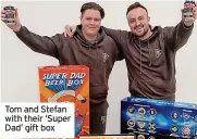  ?? ?? Tom and Stefan with their ‘Super Dad’ gift box