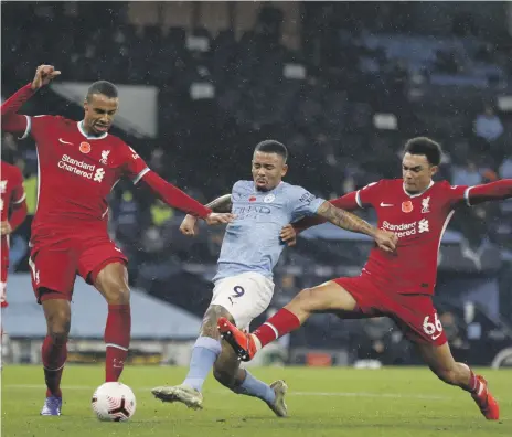  ?? EPA ?? Manchester City’s Gabriel Jesus, centre, scores the equaliser with only his second touch of the game against Liverpool