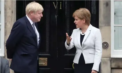  ?? Photograph: Jane Barlow/PA ?? Boris Johnson and Nicola Sturgeon outside Bute House, Edinburgh, in 2019.