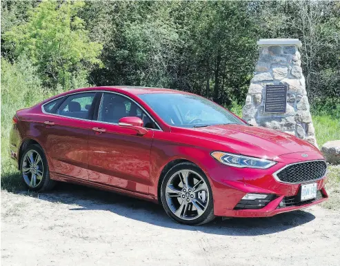  ?? PHOTOS: JIL MCINTOSH / DRIVING.CA ?? The Fusion Sport’s styling cues are subtle: black grille, larger air intakes, rear spoiler and quad exhaust tips.