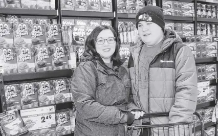  ?? LYNN CURWIN/TRURO NEWS ?? Leah Poirier and her son, Owen, enjoyed shopping at Sobeys during a recent sensory-friendly shopping hour. The Fundy Trail Centre Sobeys is offering sensory-friendly shopping on Sundays, from 6 to 7 p.m.