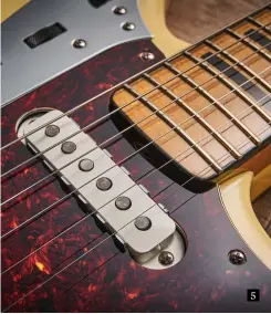  ?? ?? 5. These narrower single coils are more Fenderlike, and one reason for the sawtooth metal side and baseplates was to reduce the hum pick-up of the Jazzmaster’s single coils. Measured at output, the DCRs read 6.14kohms (bridge) and 6.36k (neck) 5