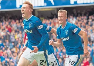  ??  ?? Hamburg-bound David Bates races away after scoring Rangers’ late winner.