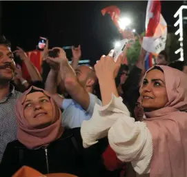  ?? Photo: Reuters ?? Supporters listen to Recep Tayyip Erdogan give a speech.