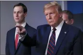  ?? ALEX BRANDON — THE ASSOCIATED PRESS ?? President Donald Trump points to a reporter to ask a question as he speaks about the coronaviru­s in the James Brady Press Briefing Room of the White House, Thursday, in Washington, as White House adviser Jared Kushner listens.