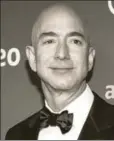  ??  ?? ■ Two notable Americans — Amazon CEO Jeff Bezos (left) and Virginia governor Ralph Northam — faced firestorms of criticism last week but they handled it differentl­y