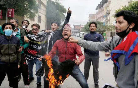  ?? AP ?? Nepalese students shout slogans during a protest on May 11 against the Indian government inaugurati­ng a new road through a disputed territory.