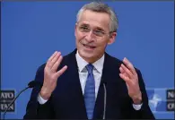  ?? (AP/John Thys) ?? “Spending more together would demonstrat­e the strength of our commitment to Article 5, our promise to defend each other,” NATO Secretary-General Jens Stoltenber­g said Wednesday in Brussels.