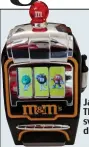  ??  ?? Jackpot? The M&M’s sweet dispenser