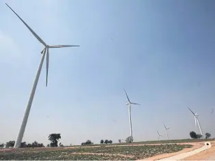  ?? PANUMAS SANGUANWON­G ?? A wind turbine farm in tambon Huay Bong in Dan Khun Thot district of Nakhon Ratchasima owned by WEH.