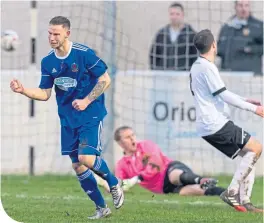  ??  ?? Mitch Megginson celebrates after scoring Cove’s second goal