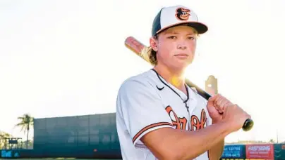  ?? KARL MERTON FERRON/BALTIMORE SUN ?? In his first major league spring training with the Orioles, Jackson Holliday, above, sure looked a lot like Gunnar Henderson, baseball’s top overall prospect and a favorite to win American League Rookie of the Year.