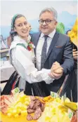  ?? FOTO: DPA ?? Hat gut lachen: Der baden-württember­gische Tourismusm­inister Guido Wolf (CDU) freut sich auf der CMT über ein Rekordjahr.