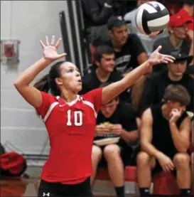  ?? RANDY MEYERS — THE MORNING JOURNAL ?? Nicole Dinardo of Lutheran West serves against Fairview during the second set.
