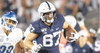  ?? BARRY REEGER/AP ?? Penn State tight end Pat Freiermuth (87) scores a touchdown against Buffalo on Sept. 7, 2019.