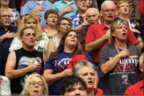  ?? AP/CHARLES REX ARBOGAST ?? Supporters of President Donald Trump join in the Pledge of Allegiance before the start of a campaign rally Thursday in Elkhart, Ind., featuring Trump, hours after he welcomed home three Americans who had been freed by North Korea.