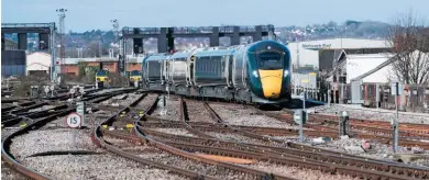  ?? JACK BOSKETT. ?? A Great Western Railway Class 800/0 arrives at Cardiff Central on March 7. The bi-mode train currently runs on diesel power from Swansea to Didcot Parkway before switching to electric power. From January, it will run to Cardiff on electric power,...