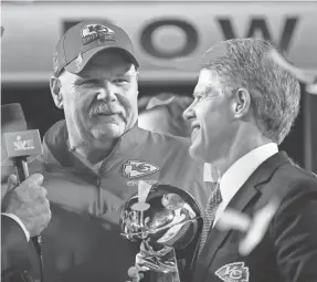  ?? MARK J. REBILAS/USA TODAY SPORTS ?? Chiefs head coach Andy Reid and owner Clark Hunt accepted the Vince Lombardi Trophy at last year’s Super Bowl.