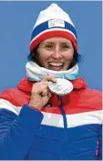  ?? Foto: afp ?? Marit Björgen jubelte über ihre elfte olympische Medaille.