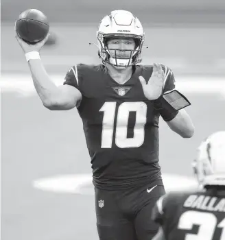  ?? ALEX GALLARDO/AP ?? Chargers rookie QB Justin Herbert has thrown for 2,146 yards and 17 touchdowns since taking over as the team’s starter in Week 2.