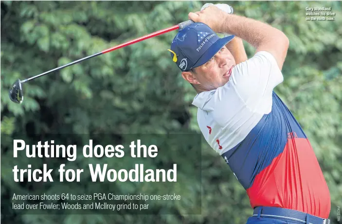  ??  ?? Gary Woodland watches his drive on the ninth hole.