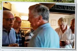  ??  ?? Fancy a pint? Sir Michael, centre, and Mr Johnson, right, at the pub