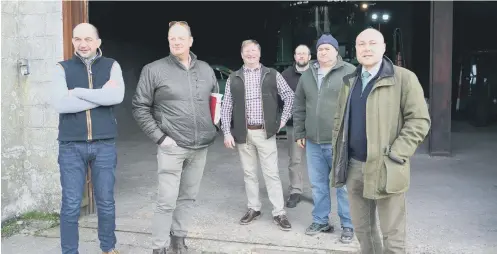  ?? ?? MP Andrew Griffith with farmers