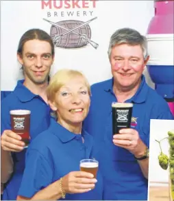  ?? ?? From left, Musket Brewery owners Rhys Williams, Linda Pizani Williams and Tony Williams; inset, hops ready for brewing