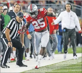 ?? [JOSHUA A. BICKEL/DISPATCH] ?? A healthy Mike Weber, above, along with star freshman J.K. Dobbins would give the Buckeyes two effective options at running back. Weber, who topped 1,000 yards last season, has been bothered by a hamstring injury.