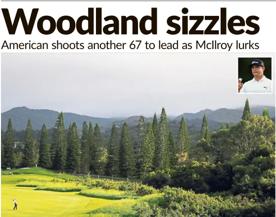  ?? — AFP ?? Sparkling form: Gary Woodland (bottom left and inset) of the United States plays a shot on the 18th hole during the second round of the Tournament of Champions at the Plantation Course at Kapalua Golf Club in Lahaina, Hawaii, on Friday.