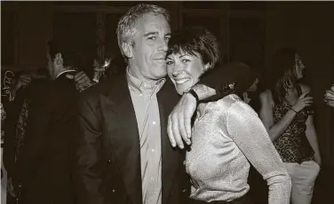  ?? Patrick McMullan / Getty Images ?? Jeffrey Epstein and Ghislaine Maxwell attend a concert in 2005. She now has been arrested and is accused of playing a major role in the late financier’s alleged sex-traffickin­g operation.