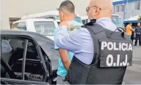  ?? OIJ ?? Los oficiales fueron detenidos por agentes de Delitos Varios del OIJ.