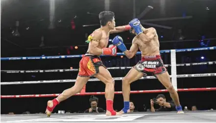  ?? Photo of Muay Thai Rampage ?? FIST OF FURY: Trương Cao Minh Phát of Việt Nam (left) is one of 16 HCM City.
ghters selected to compete at the Muay Thai Rampage x Road To ONE on May 19 in