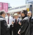  ??  ?? Director of South African Primary Education Support Initiative (Sapesi) Tadashi Hasunuma, centre, interacts with MEC of Finance and Ivan Meyer, left. Far right is the Consul of Japan in Cape Town Yasushi Naito and in front of him, managing director of Ocean Network Express South Africa Takayasu Akiba.