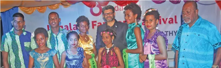  ?? Photo: DEPTFO News ?? Attorney-General Aiyaz Sayed-Khaiyum with Lagalaga Primary School officials, guests and the Vodafone Lagalaga Farmers Carnival contestant­s. Lagalaga Primary School Year Seven student Mere Rauqele (eighth from left), was crowned the Vodafone Lagalaga Farmers queen on August 10, 2019.