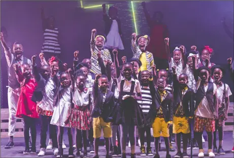  ?? COURTESY PHOTOGRAPH­S ?? Above and below: The Watoto Children’s Choir will perform at Emanuel Lutheran Church in Lodi next week. The choir gives Ugandan orphans a chance to experience other cultures while spreading awareness about Watoto Child Care Ministries, which cares for...