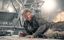  ??  ?? DOWN BUT NOT OUT: Cpl. Ford (Wyatt Russell) is determined to carry out his mission.