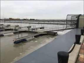  ?? RICHARD PAYERCHIN — THE MORNING JOURNAL ?? The docks at Spitzer Lakeside Marina sit empty Feb. 14 in the cold weather.