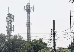  ?? PATTANAPON­G HIRUNARD ?? Telecom towers in a residentia­l area of Bangkok’s Sai Mai district. Locals have protested towers in their neighbourh­oods over health fears.