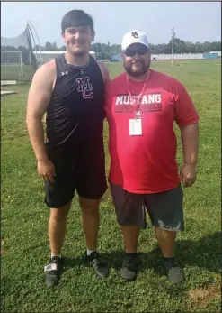  ?? Courtesy photo ?? McDonald County junior Toby Moore, shown with Coach Chris Kane, qualified for state in the discus with a throw of 141-08.00 at the Sectional Meet held Saturday, May 20, in West Plains.