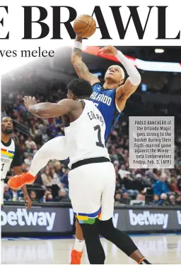  ?? (AFP) ?? PAOLO BANCHERO of the Orlando Magic goes strong to the basket during their figth-marred game against the Minnesota Timberwolv­es Friday, Feb. 3.