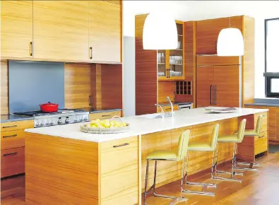  ?? CHANCEY DESIGN ?? The move toward a more streamline­d kitchen design has become increasing­ly popular in recent years.