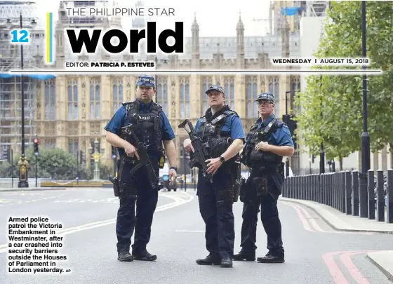  ?? AP ?? Armed police patrol the Victoria Embankment in Westminste­r, after a car crashed into security barriers outside the Houses of Parliament in London yesterday.