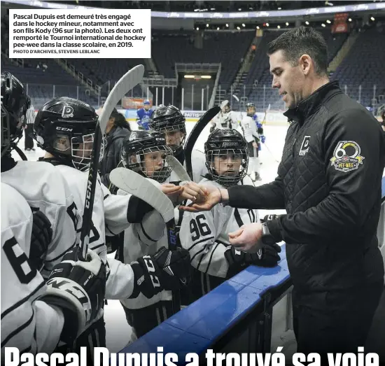  ?? PHOTO D’ARCHIVES, STEVENS LEBLANC ?? Pascal Dupuis est demeuré très engagé dans le hockey mineur, notamment avec son fils Kody (96 sur la photo). Les deux ont remporté le Tournoi internatio­nal de hockey pee-wee dans la classe scolaire, en 2019.