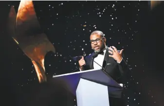  ?? Emma McIntyre / Getty Images ?? Writer-director Jordan Peele accepts the award for best original screenplay for “Get Out” during the Writers Guild of America awards ceremony in Beverly Hills on Feb. 11.