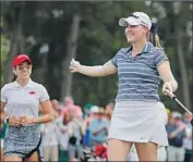  ?? Kevin C. Cox Getty Images ?? JENNIFER KUPCHO of Wake Forest enjoys the moment after finishing with a birdie at Augusta.