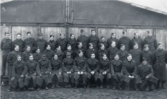  ??  ?? George Larter senior, far right, back row, pictured during his days in a prisoner of war camp.