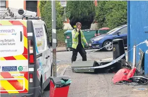  ?? Picture: Mhairi Edwards. ?? An Openreach engineer at the damaged telephone exchange box on Sandeman Street, Dundee.