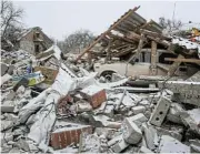  ?? /Reuters ?? Civilian targets: A house destroyed during a Russian missile strike in the town of Zmiiv in Ukraine.